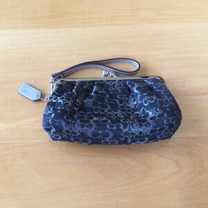 Elegant Black Coach Wristlet